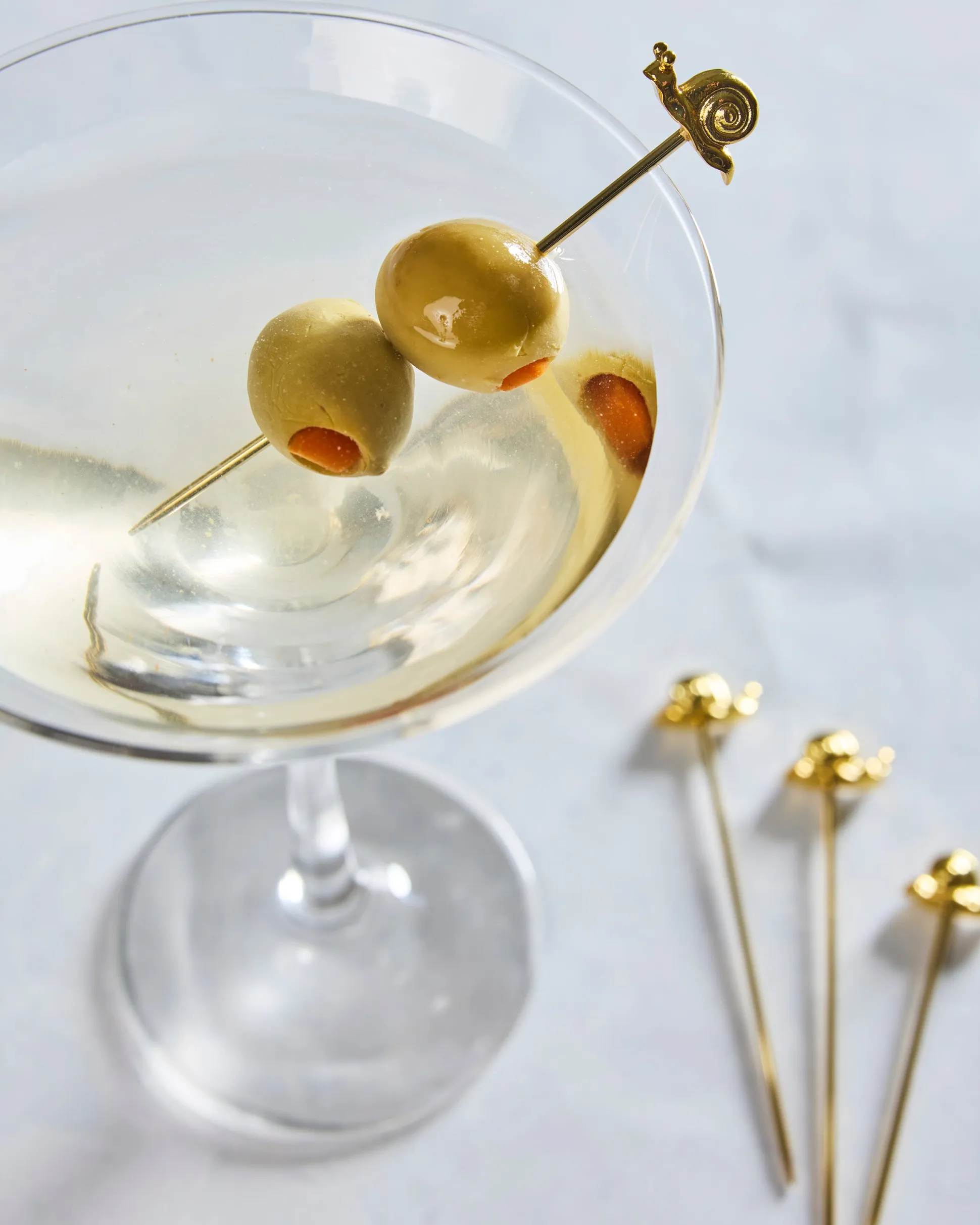 Garden Snail Cocktail Picks in Gold