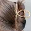 Large Hollow Twisted Hair Claw Clip in Gold