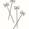 Silver Bow Cocktail Picks in House of Gleason