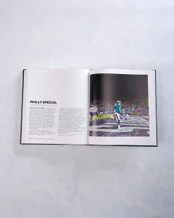 The Story of Football in 100 Photographs By Sports Illustrated in Navy Blue